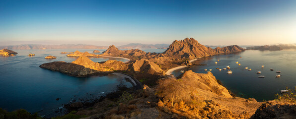 Panoramic view of sunrise over mountains and sea at Rinca (Komodo National Park) 