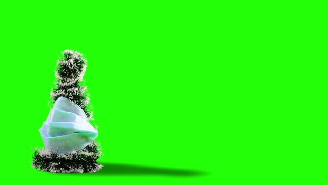 christmas tree in medical mask spinning in loop motion over green screen background