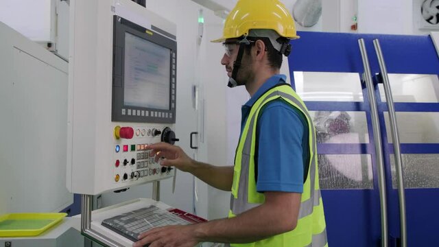 Asian male worker/engineer wearing disposal face mask for protect dust smoke and covid-19 virus while working in workplace or factory. Engineering and industrial concept.