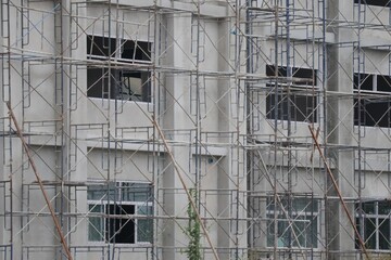 building under construction with scaffolding