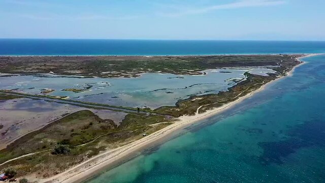 Aerial view of idyllic beach in the area of Thessaloniki, Greece, side movement by drone