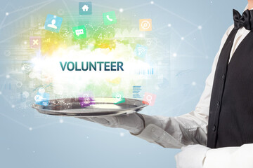 Waiter serving social networking concept with VOLUNTEER inscription
