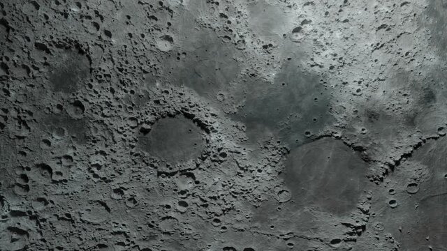Textured surface of the moon close-up in motion. 3d animation. Elements of this image furnished by NASA