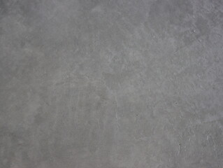 The texture of the gray decorative plaster background for design.