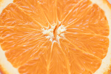 cut half of a fresh juicy textured orange, macro