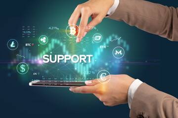 Close-up of a touchscreen with SUPPORT inscription, business opportunity concept