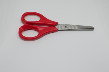 scissors on red background