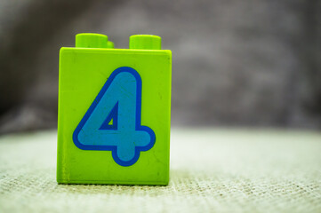 POZNAN, POLAND - Oct 14, 2020: blocks toy block with number four