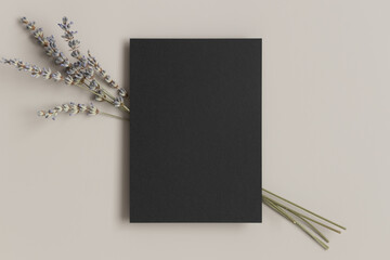 Black invitation card mockup with a bouquet of a lavender. 5x7 ratio, similar to A6, A5.