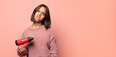 feeling puzzled and confused, with a dumb, stunned expression looking at something unexpected