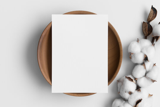 White Invitation Card Mockup On A Wooden Plate With A Dried Cotton Branch. 5x7 Ratio, Similar To A6, A5.