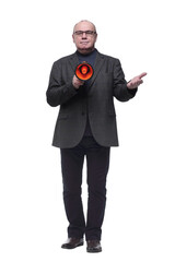 in full growth. a business man with a red megaphone.