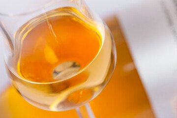 glasses and bottles with orange wine