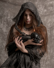 Close-up portrait of a witch, ugly old grey costome