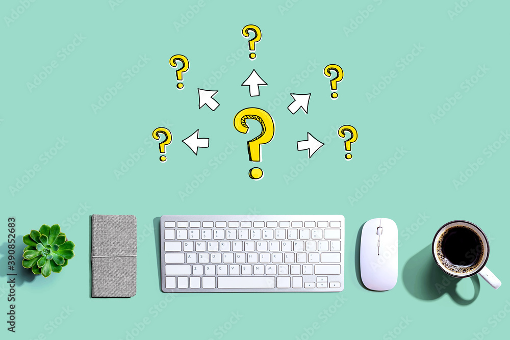 Poster big and small question marks with arrows with a computer keyboard and a mouse