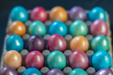 Fototapeta na wymiar Easter background with hand painted purple, blue, green, orange