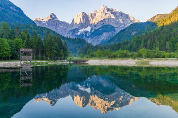 Fototapeta na wymiar Lake and mountains near the village Kranjska Gora in Triglav national park, Slovenia