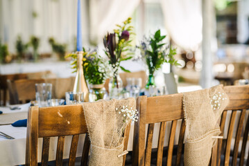 Table decoration for a special occasion -  boho wedding table set up. Outdoor wedding/party