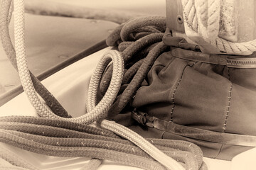 Fototapeta na wymiar Ropes With Sail Cover in Sepia
