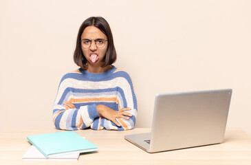 feeling disgusted and irritated, sticking tongue out, disliking something nasty and yucky