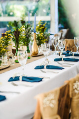 Table decoration for a special occasion -  boho wedding table set up. Outdoor wedding/party