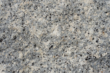 Natural stone grey granite texture and background.  Biotite Granite rock texture.