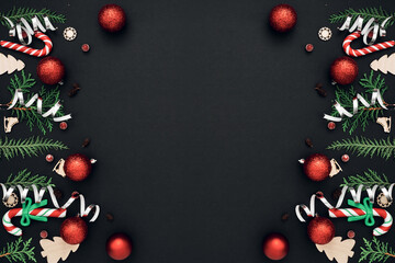 New Year's, festive decor on a black background. Copy space, flat lay, mock up, top view.