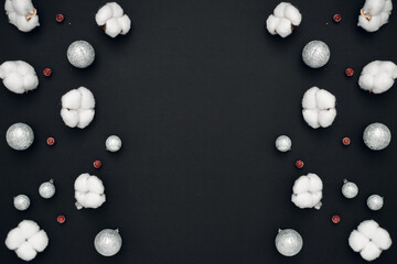 New Year's, festive decor on a black background. Copy space, flat lay, mock up, top view.