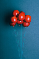 An unusual bouquet of flying apples. The art of originality, abstacle.