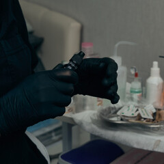 The process of preparing equipment and cosmetics for permanent eyebrow makeup. Make-up. The work of...