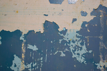 Old rusty metal texture with peeled paint.