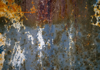 Old rusty metal texture with peeled paint.