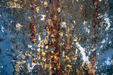 Old rusty metal texture with peeled paint.