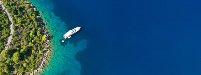 Aerial drone ultra wide panoramic photo of beautiful turquoise bay in island of Ithaki or Ithaca, Ionian, Greece