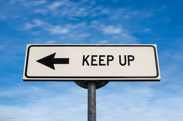 Keep up road sign, arrow on blue sky background. One way blank road sign with copy space. Arrow on a pole pointing in one direction.