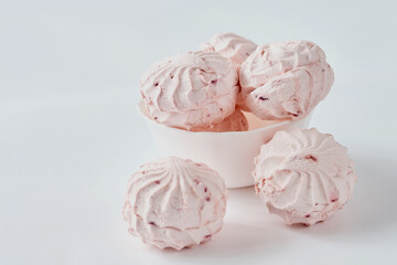 light background and gentle marshmallows, on a white background. top view, close-up.