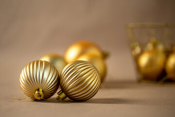 handmade golden Christmas tree toys on kraft paper background