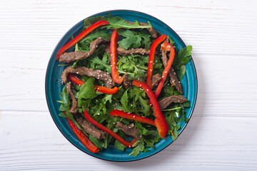 Healthy salad with beef red pepper