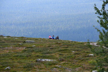 Fototapeta premium hikers rest on the hill