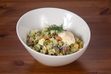 Traditional Russian salad with meat