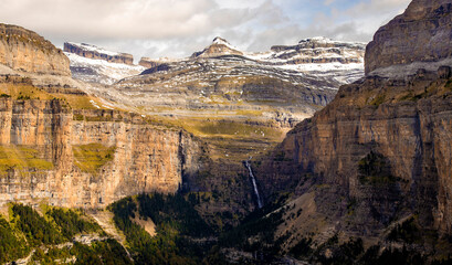 amazing view of the ordesa valley in autumn and waterfall in the cotatuero circus