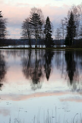 Autumn sunset landscape on lake