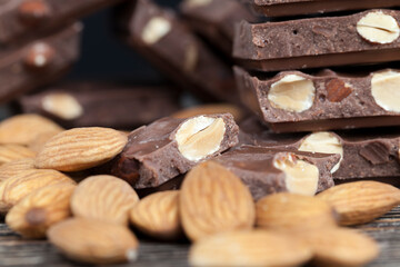 almonds and chocolate mixed in sweet chocolate