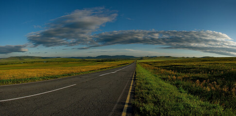 Russia. South Of Western Siberia. Republic Of Khakassia. Picturesque horizons of endless steppes along the highway between the villages of Shira and Uzhur.