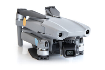 Gray mini drone on a white background