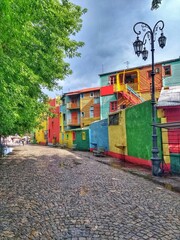 Obraz premium El Caminito, La Boca, Buenos Aires, Argentina. Caminito is a street museum and a traditional alley, located in La Boca, a neighborhood of Buenos Aires, Argentina. 