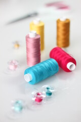Fototapeta na wymiar spools of thread for sewing