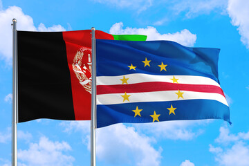 Cape Verde and Afghanistan national flag waving in the wind on a deep blue sky together. High quality fabric. International relations concept.