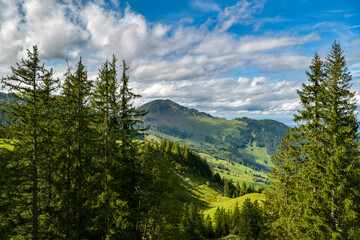 Fototapeta na wymiar Picturesque view on green mountains as seen from Klewenalp, Switzerland
