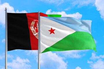 Djibouti and Afghanistan national flag waving in the wind on a deep blue sky together. High quality fabric. International relations concept.